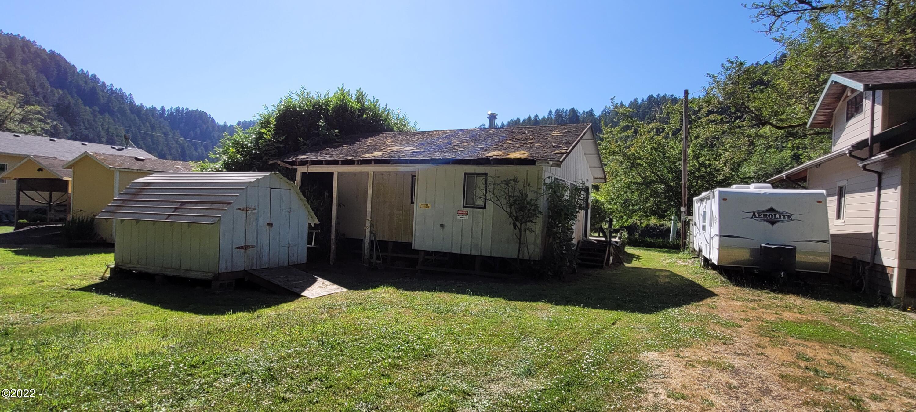 325 East Aldersprings Road Waldport, OR 97394 - Photo 4 of 7 Road entrance view