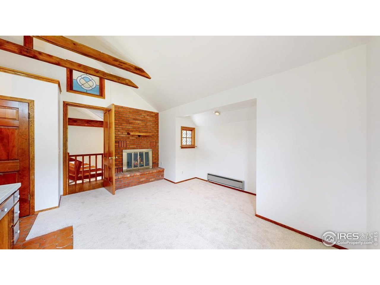 253 Apache Road Lyons, CO 80540 - Photo 14 of 32 Primary Bedroom Fireplace