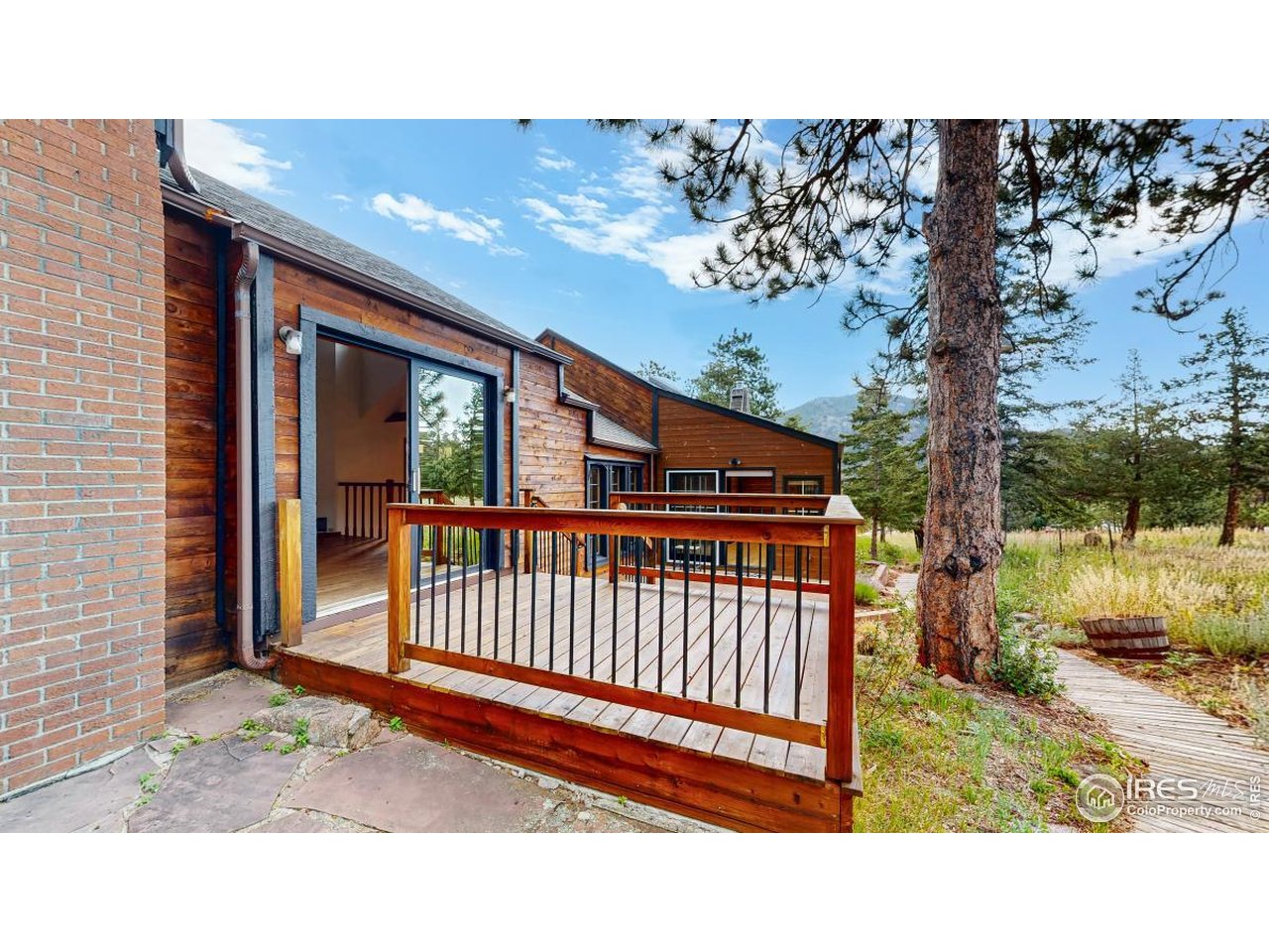 253 Apache Road Lyons, CO 80540 - Photo 21 of 32 Huge Flagstone Patio & Garden