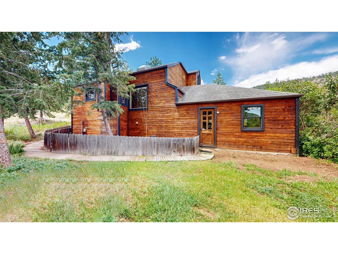 253 Apache Road Lyons, CO 80540 - Photo 26 of 32 Garage Access & Fenced Dog Yard