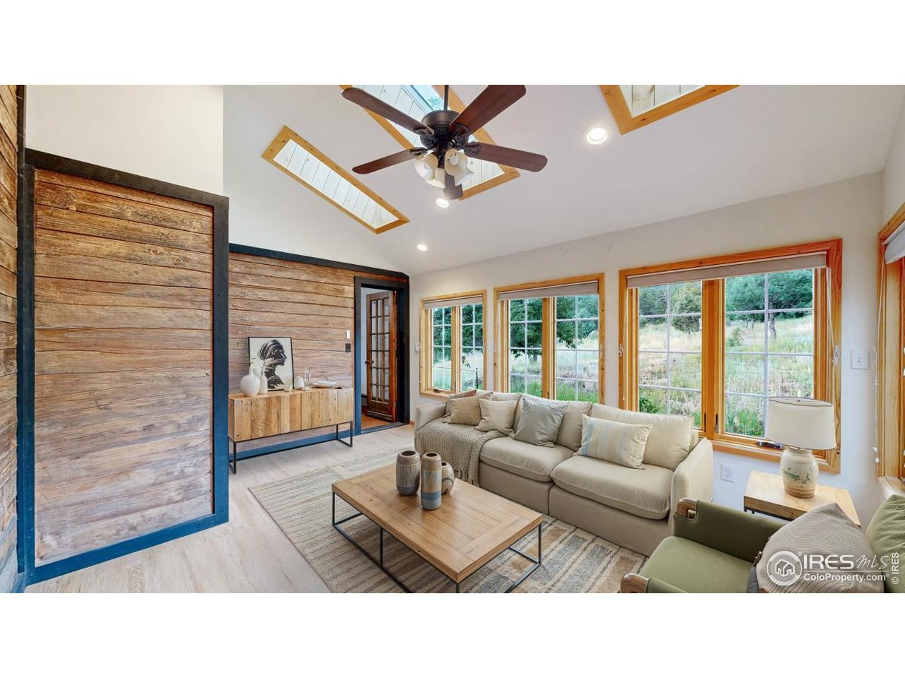253 Apache Road Lyons, CO 80540 - Photo 9 of 32 Sunroom/Family Room - Windows & Skylights