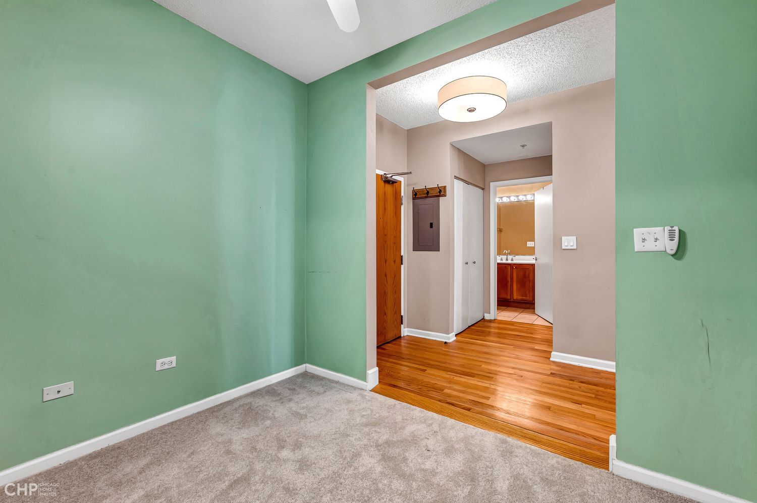 1717 South Prairie Avenue, Unit 1403 Chicago, IL 60616 - Photo 15 of 41 a view of a hallway with wooden floor