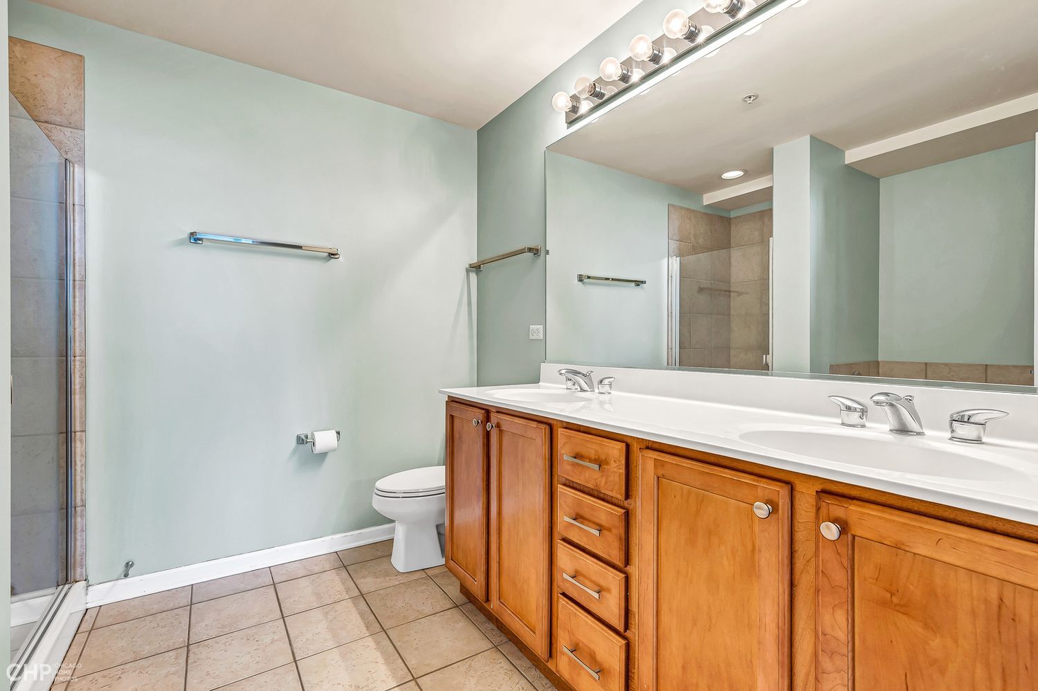 1717 South Prairie Avenue, Unit 1403 Chicago, IL 60616 - Photo 24 of 41 a spacious bathroom with a granite countertop sink toilet and shower
