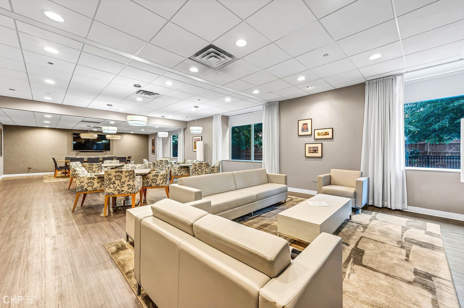 1717 South Prairie Avenue, Unit 1403 Chicago, IL 60616 - Photo 31 of 41 a living room with lots of furniture and a large window