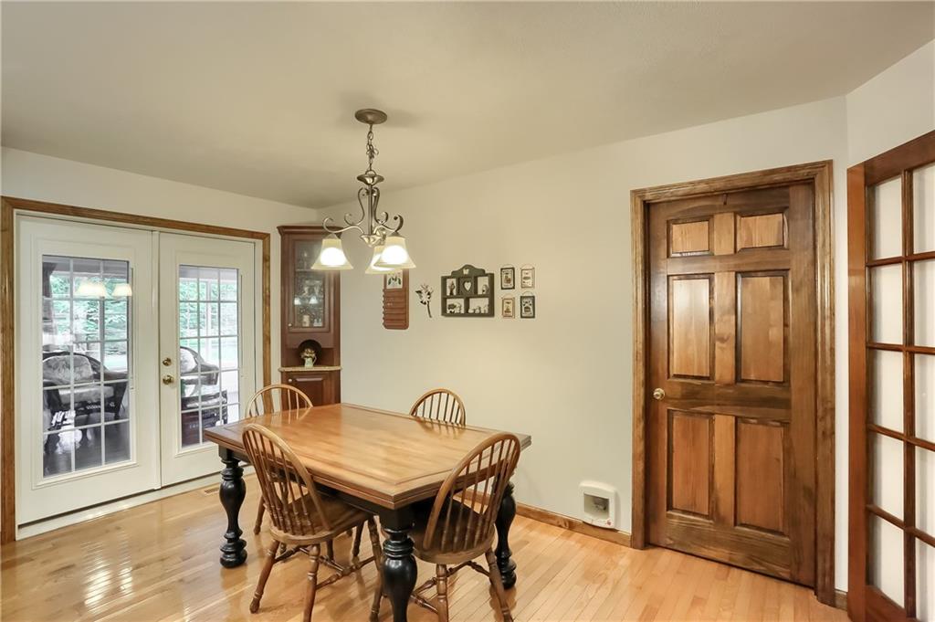 233 Foxglove Road Baden, PA 15005 - Photo 11 of 25 Access to the generously sized laundry room is adjacent to the eat in dining area, that also provides access to the three season room.