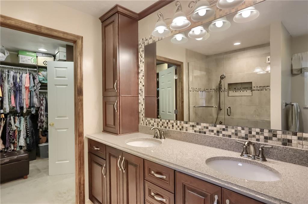 233 Foxglove Road Baden, PA 15005 - Photo 18 of 25 The private bathroom and enormous master closet are highlights of this master suite.