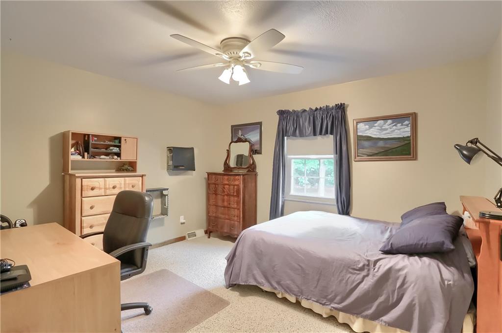 233 Foxglove Road Baden, PA 15005 - Photo 19 of 25 Guest bedrooms each have ample storage with closet systems and neutral tones.
