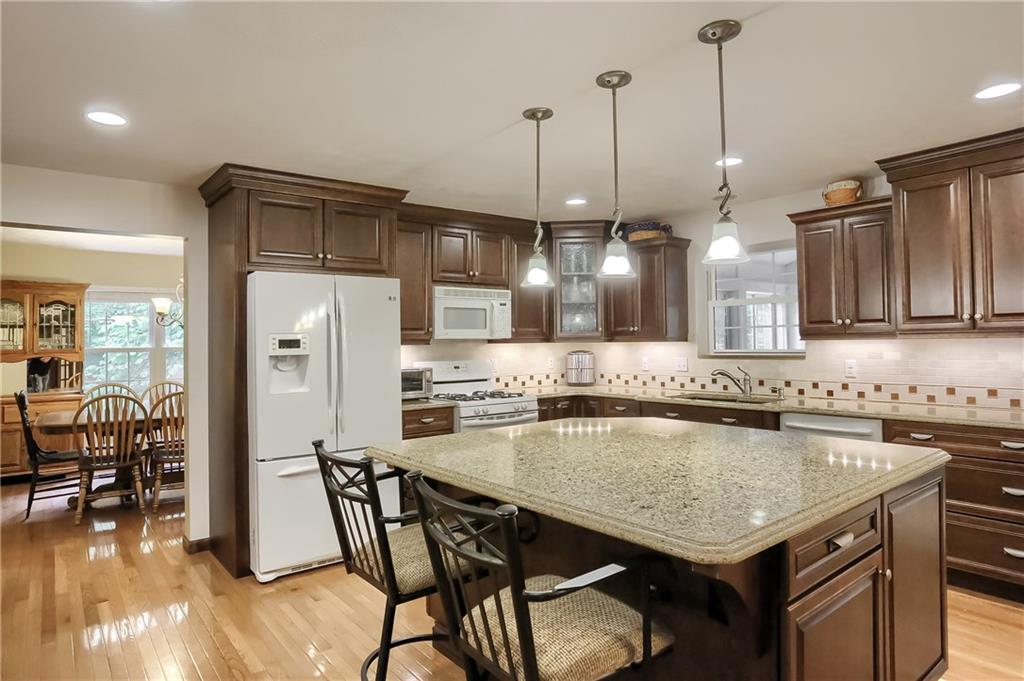 233 Foxglove Road Baden, PA 15005 - Photo 9 of 25 Access from the dinning room makes entertaining in these two spaces easy.