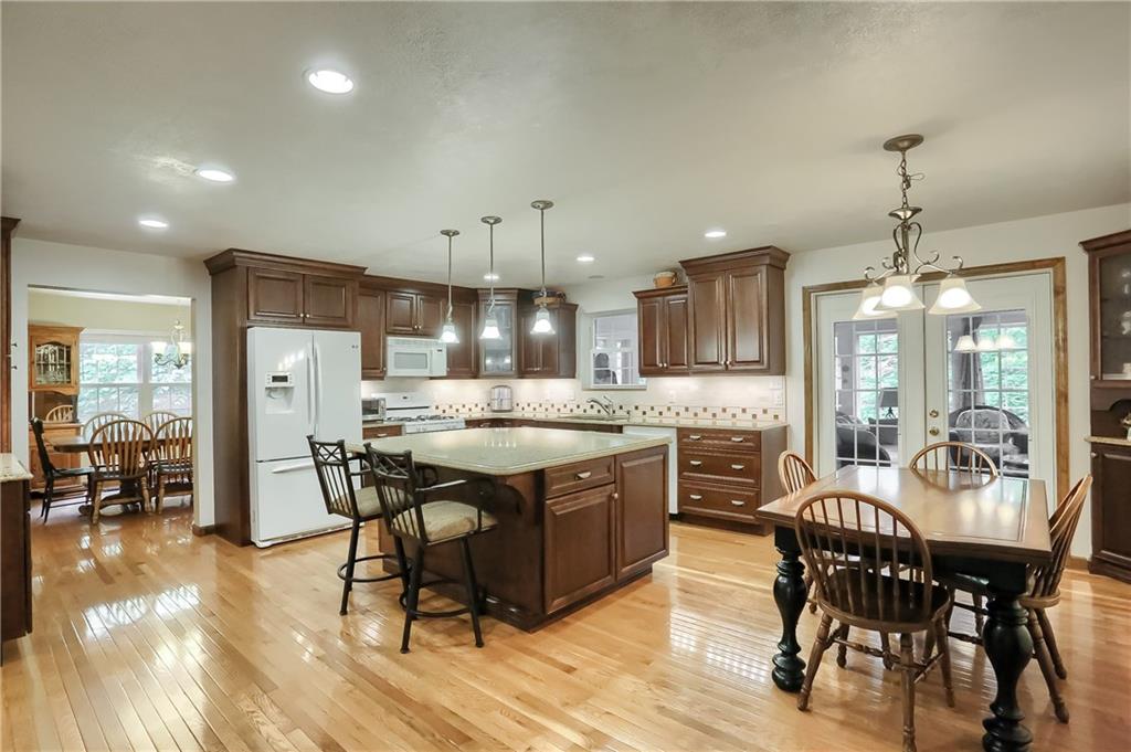 233 Foxglove Road Baden, PA 15005 - Photo 10 of 25 The hub of the home is the kitchen with multiple entertaining areas, including a eat in dining area for everyday meals.