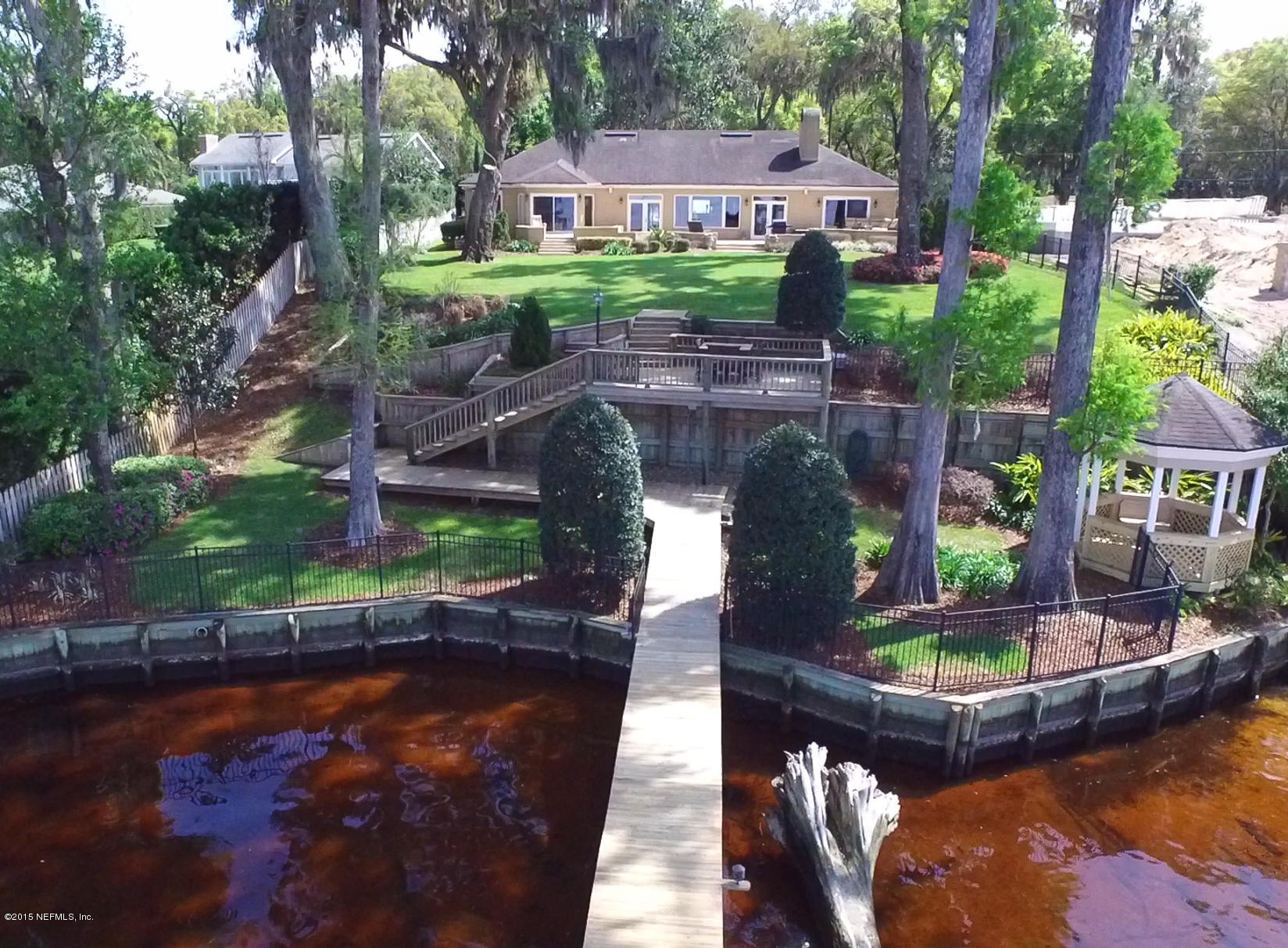 3245 Front Road Jacksonville, FL 32257 - Photo 3 of 51 a view of swimming pool with a patio