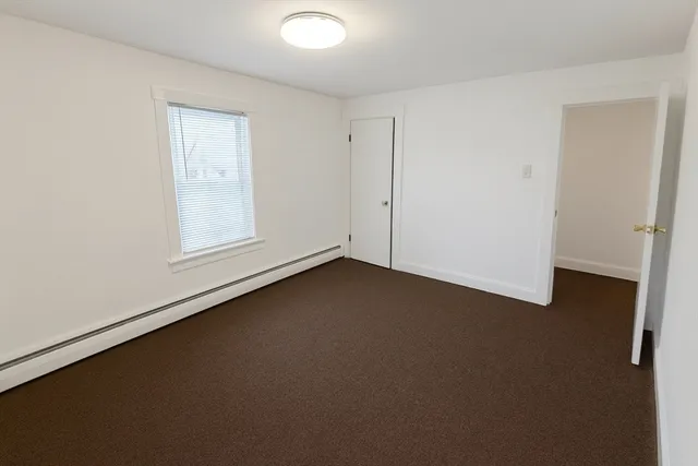 an empty room with a door