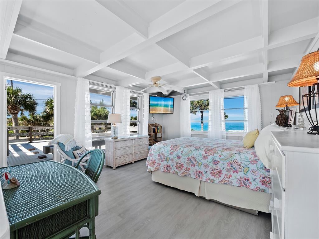 1620 Casey Key Road Nokomis, FL 34275 - Photo 20 of 49 a bedroom with bed and wooden floor