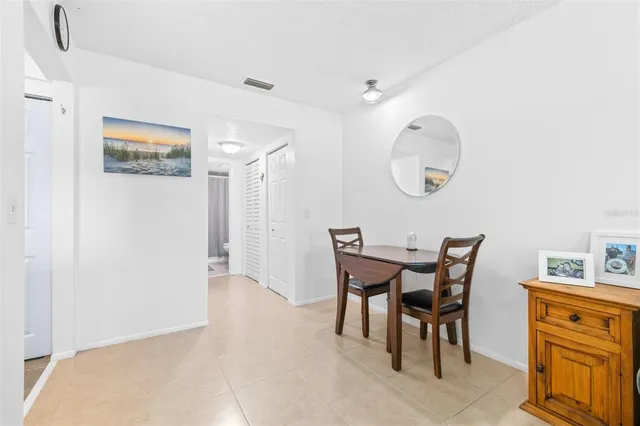 a view of a dining room with furniture