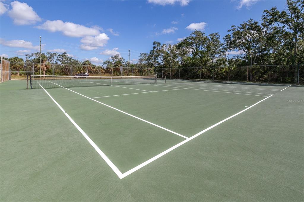1250 South Pinellas Avenue, Unit 711 Tarpon Springs, FL 34689 - Photo 25 of 33 a view of a tennis court