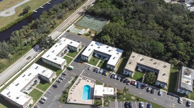 an aerial view of a house with a garden