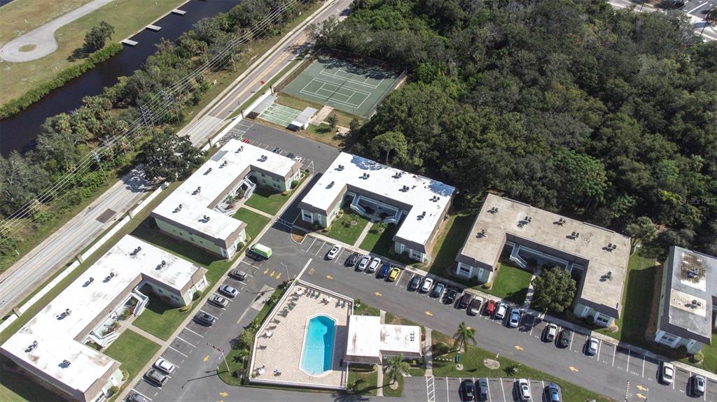 1250 South Pinellas Avenue, Unit 711 Tarpon Springs, FL 34689 - Photo 29 of 33 an aerial view of a house with a garden