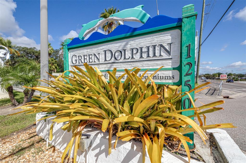 1250 South Pinellas Avenue, Unit 711 Tarpon Springs, FL 34689 - Photo 3 of 33 a sign on the wall of a building