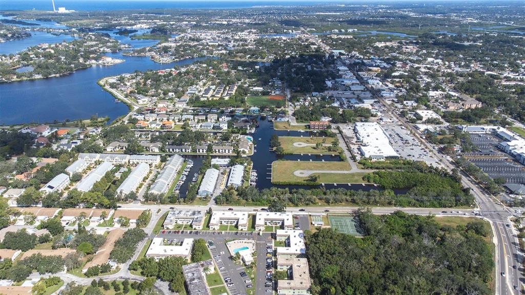 1250 South Pinellas Avenue, Unit 711 Tarpon Springs, FL 34689 - Photo 32 of 33 an aerial view of residential building with outdoor space