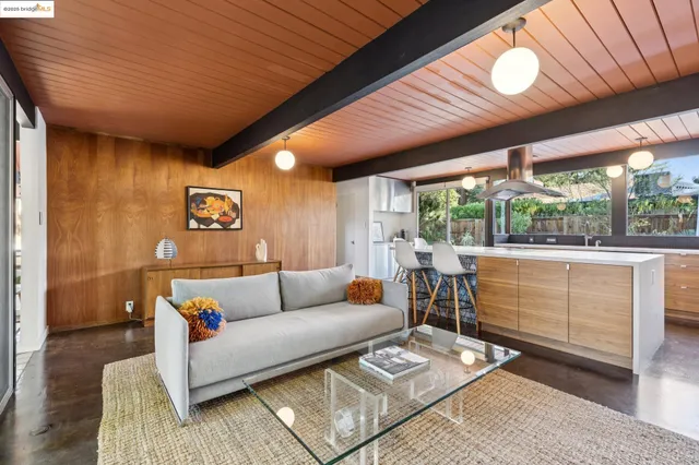 a view of a swimming pool with sitting area