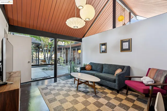 a bathroom with a tub and shower