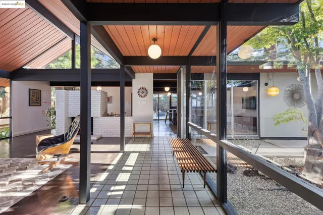 a room with lots of tables and chairs