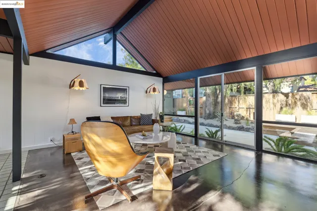 a living room with large window