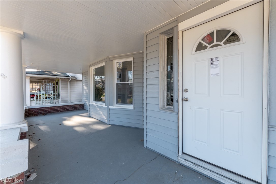 1228 Melbourne Road Cleveland, OH 44112 - Photo 2 of 35 Property entrance with covered porch