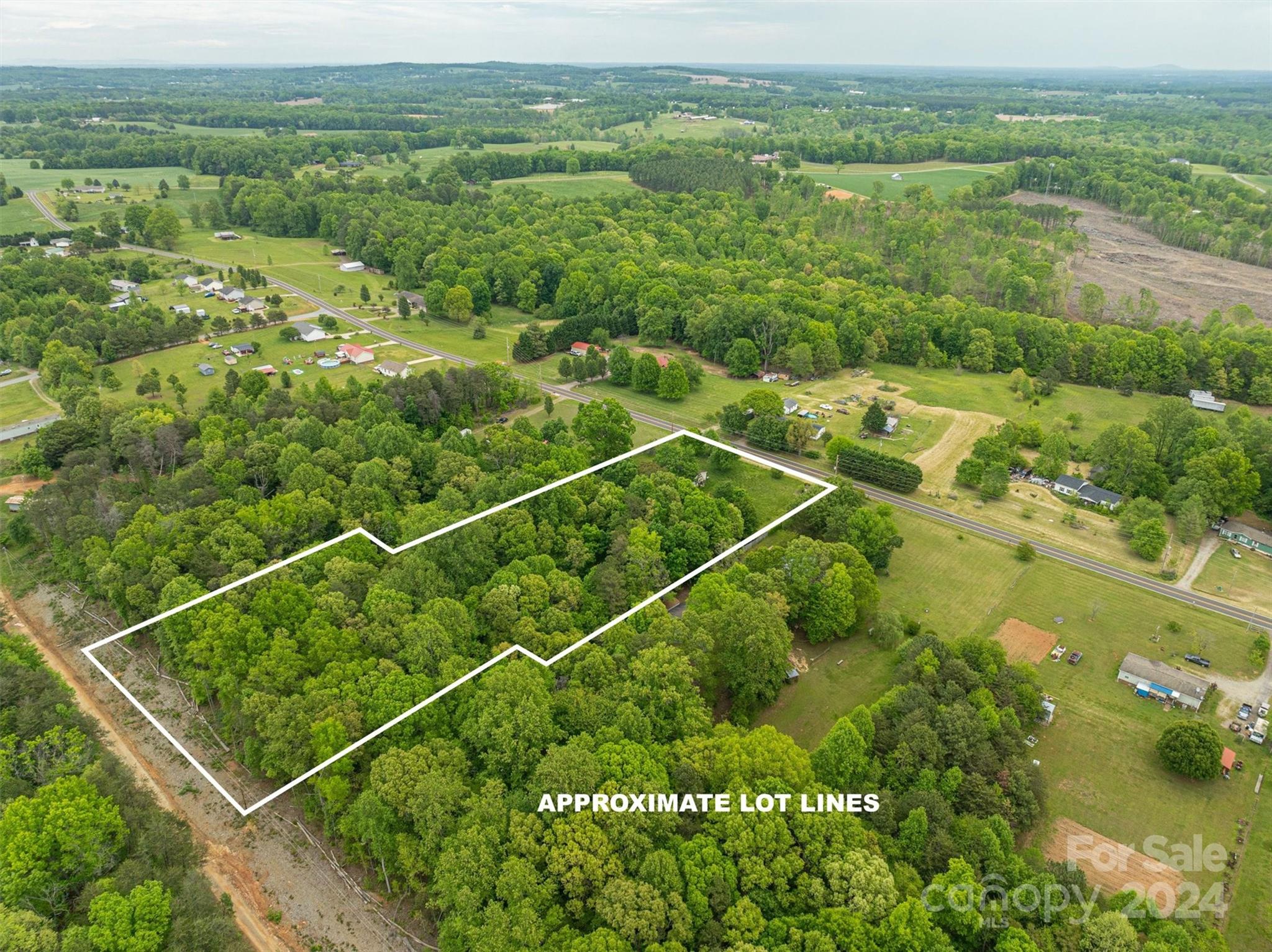 733 Cedar Grove Church Road Vale, NC 28168 - Photo 2 of 9 a view of a field with an ocean