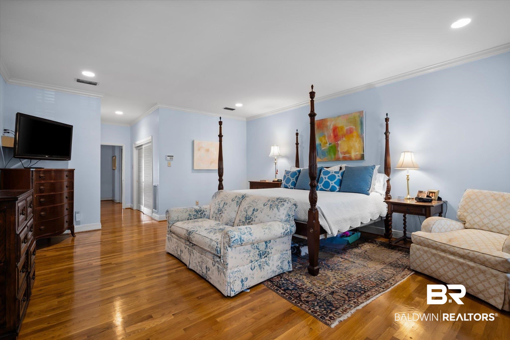 143 Myrtlewood Lane Mobile, AL 36608 - Photo 27 of 55 Bedroom featuring wood finished floors, visible vents, baseboards, recessed lighting, and ornamental molding
