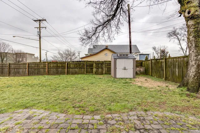 a backyard of a house with lots of green space