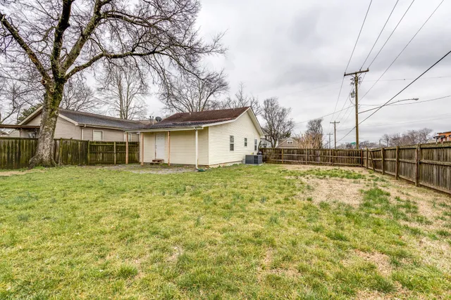 a house view with swimming pool