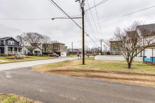 a view of street with houses