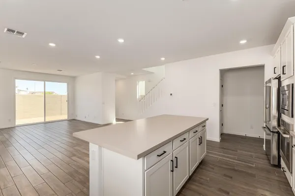 wooden floor and window in an empty room