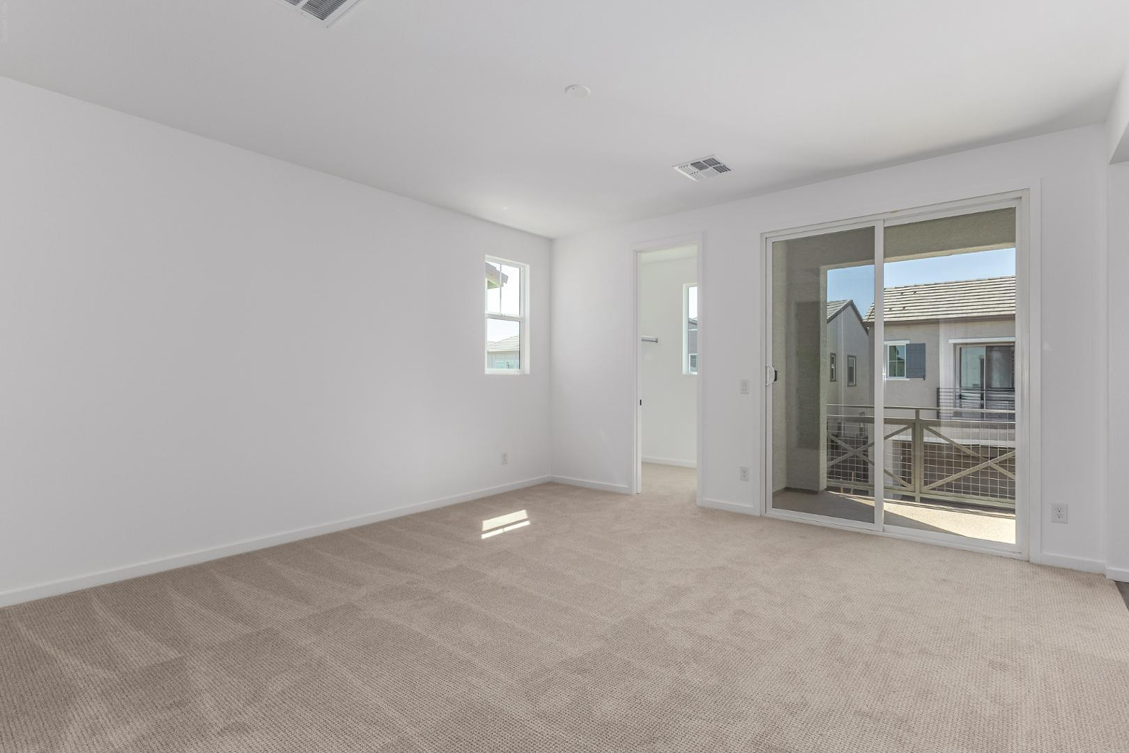 2434 West Maximo Way Phoenix, AZ 85085 - Photo 14 of 35 wooden floor and window in an empty room