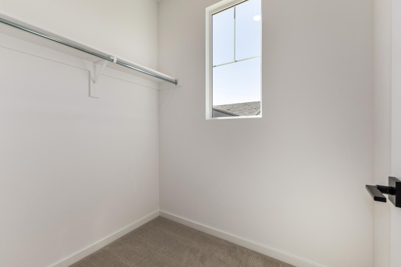 2434 West Maximo Way Phoenix, AZ 85085 - Photo 20 of 35 a small space with a window and a fan