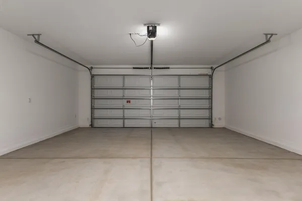 a view of a balcony with wooden floor and fence
