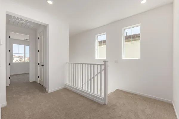 a bathroom with a toilet and a bathtub