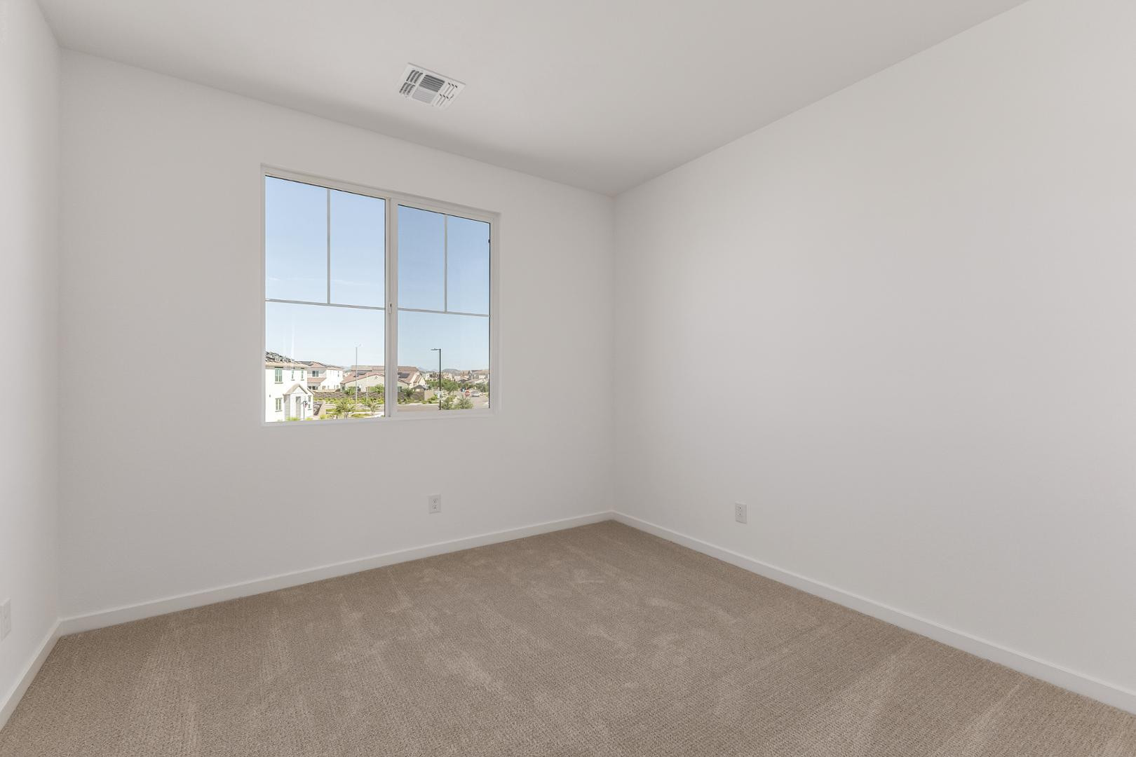 2434 West Maximo Way Phoenix, AZ 85085 - Photo 33 of 35 a view of an empty room with a window