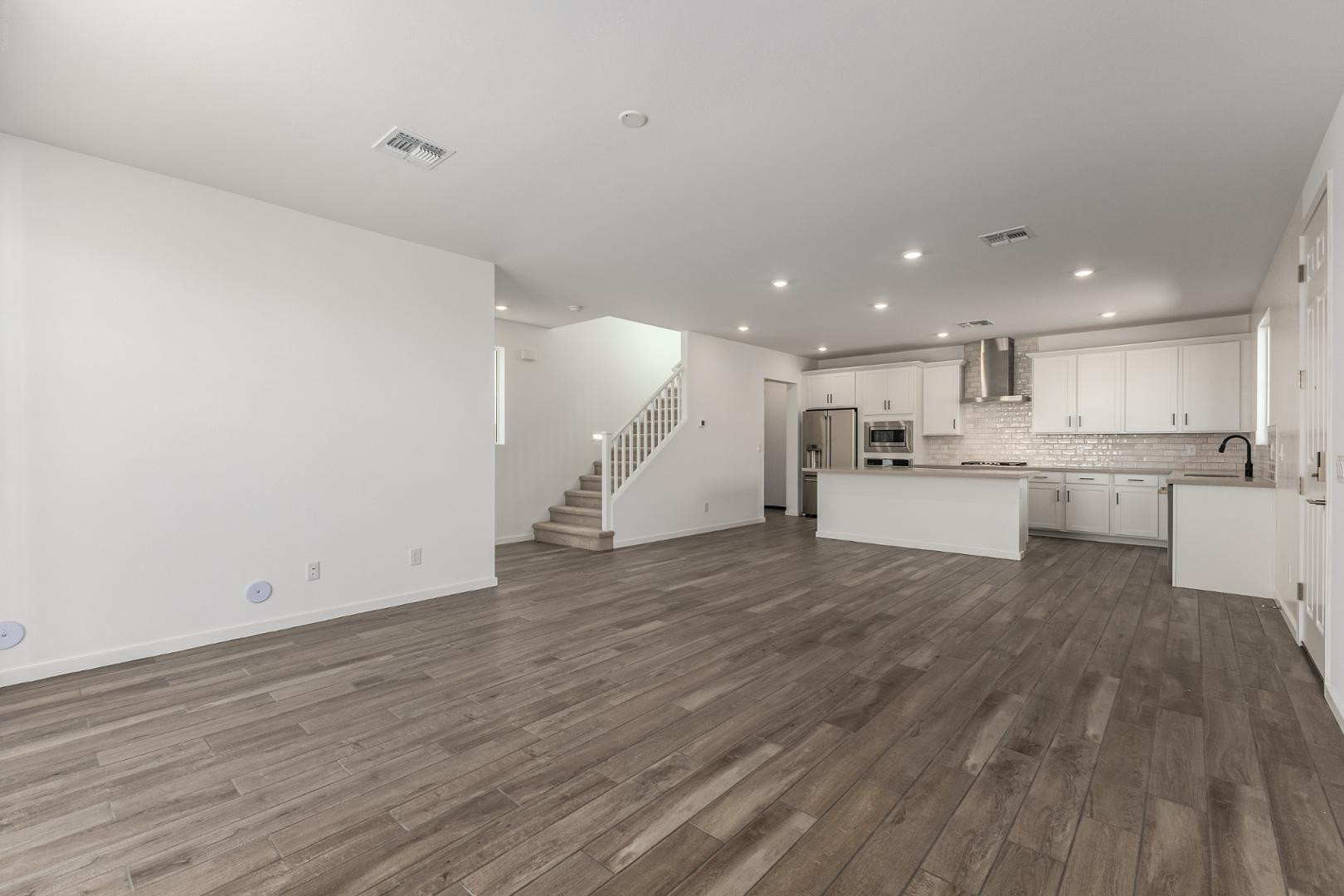 2434 West Maximo Way Phoenix, AZ 85085 - Photo 8 of 35 a view of kitchen with wooden floor