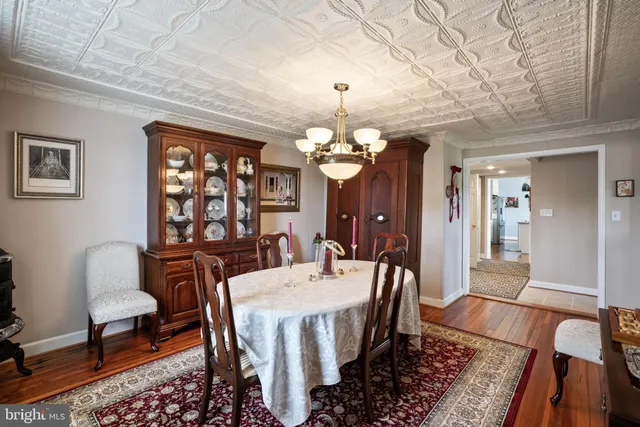 a kitchen with granite countertop a stove and a sink