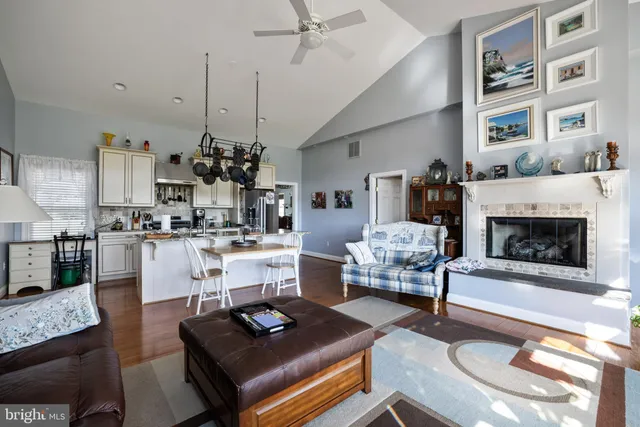 a bathroom with a bathtub a shower a sink and a window
