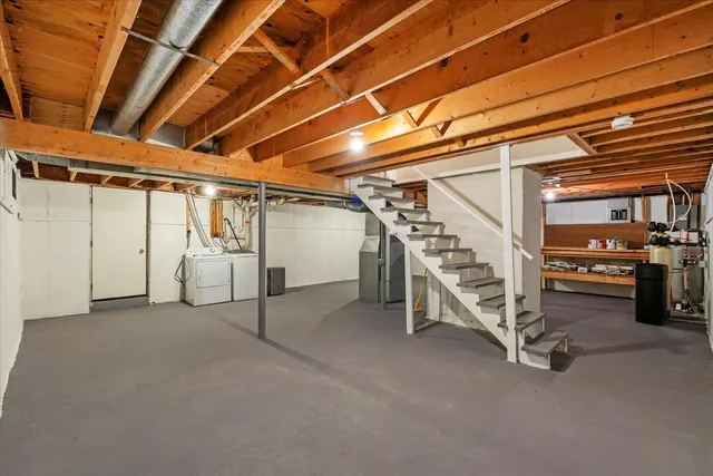 a view of an empty room with white walls