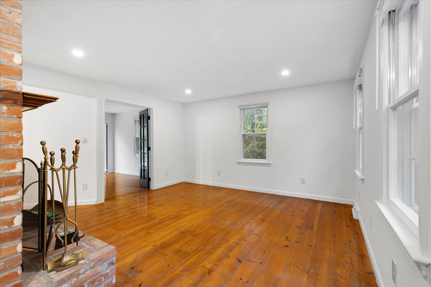 515 Cedar Street West Barnstable, MA 02668 - Photo 4 of 26 a view of livingroom with hardwood floor and a ceiling fan