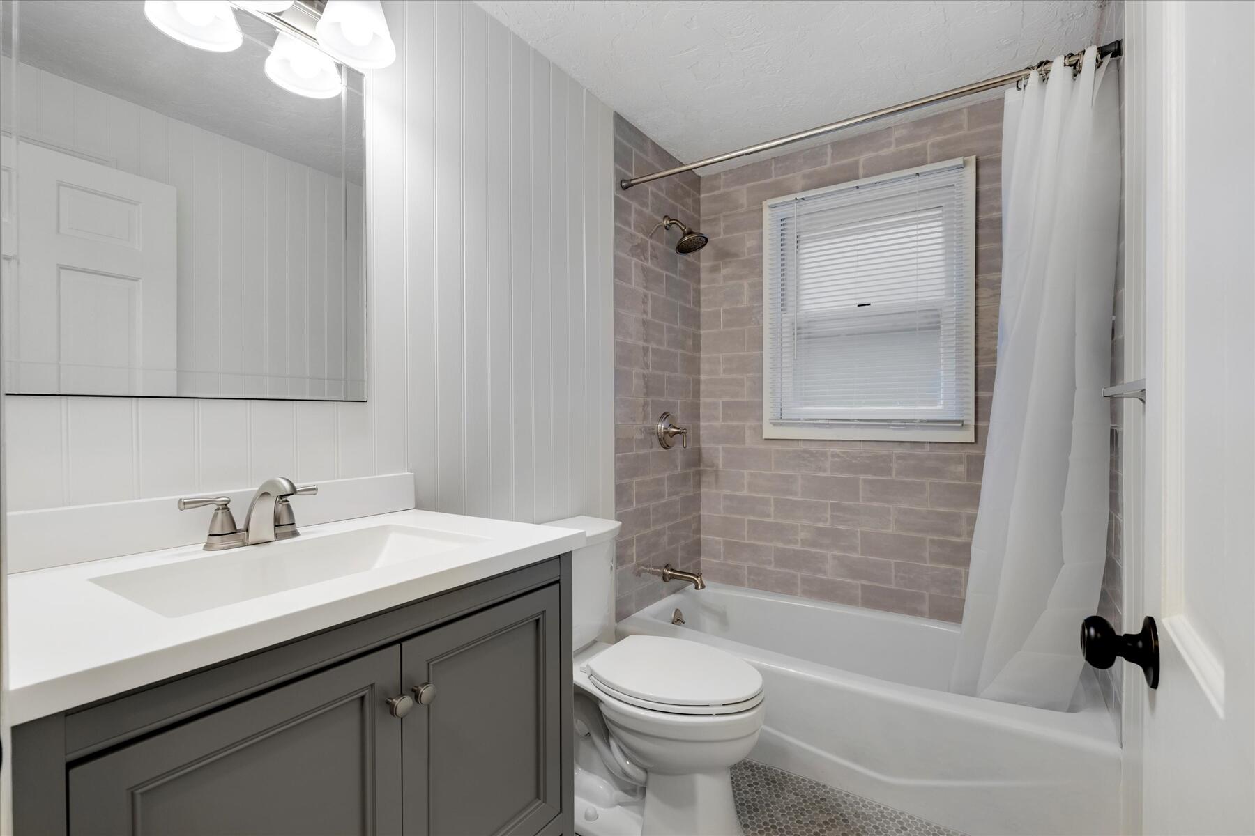 515 Cedar Street West Barnstable, MA 02668 - Photo 10 of 26 a bathroom with a sink a toilet and shower