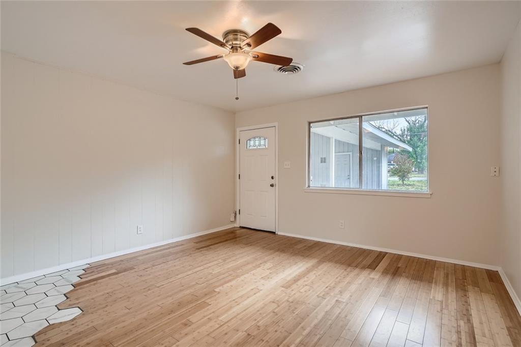 2101 Wheless Lane, Unit A Austin, TX 78723 - Photo 2 of 11 Foyer featuring light wood-style floors and ceiling fan
