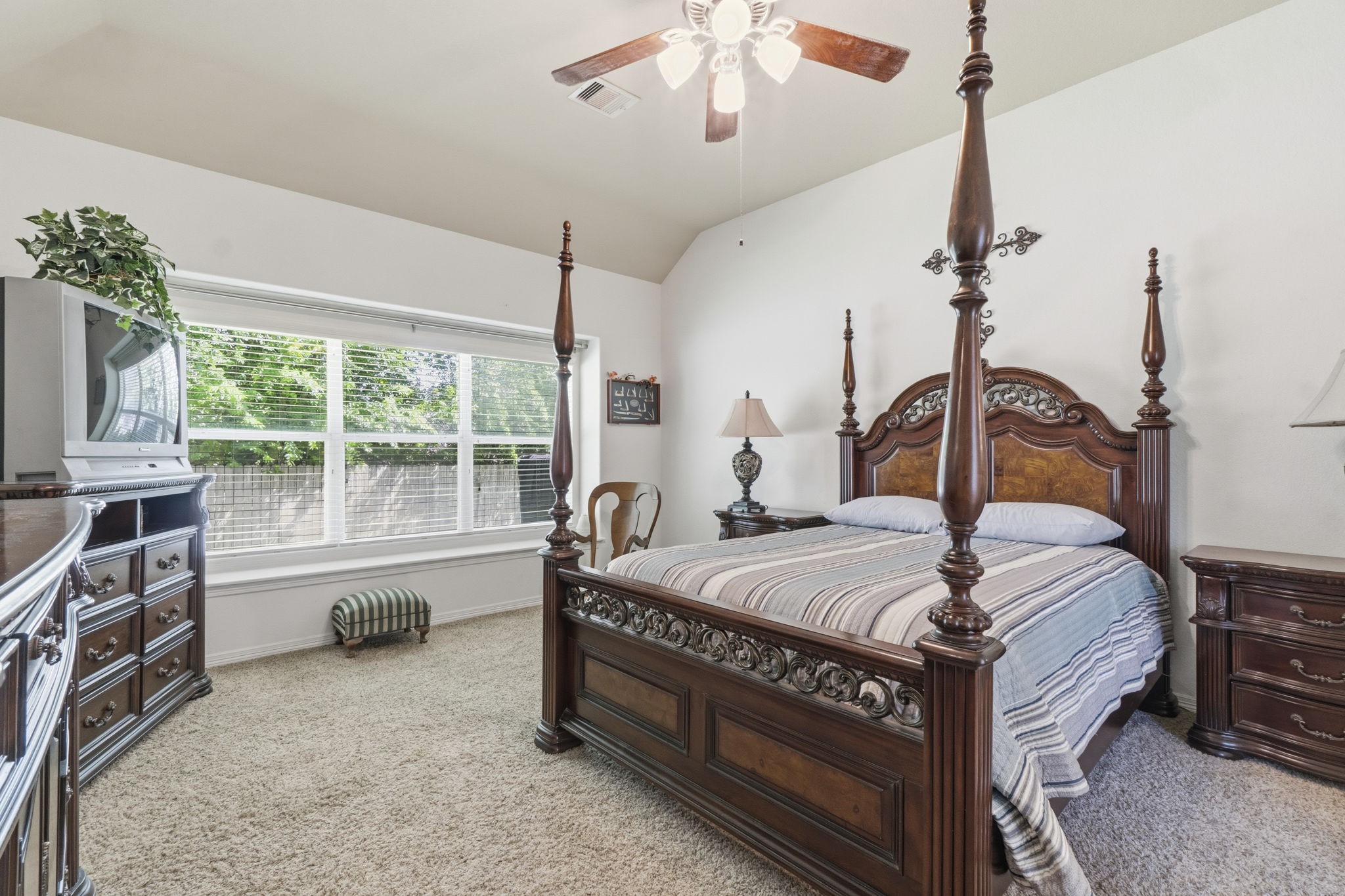 10802 Windswept Montgomery, TX 77356 - Photo 37 of 42 a bedroom with bed and large windows