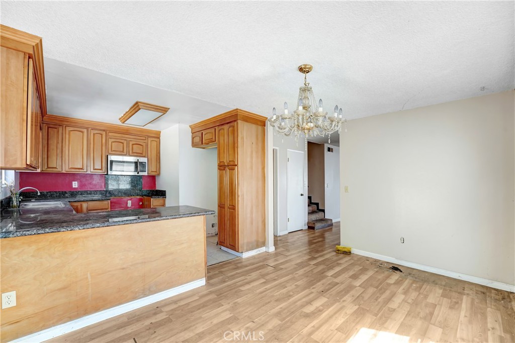 21801 Foley Avenue Carson, CA 90745 - Photo 6 of 10 a view of a kitchen and utility room
