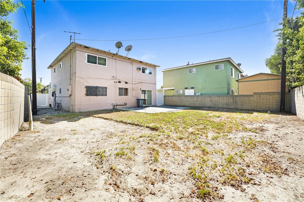 21801 Foley Avenue Carson, CA 90745 - Photo 10 of 10 a front view of a house with a yard