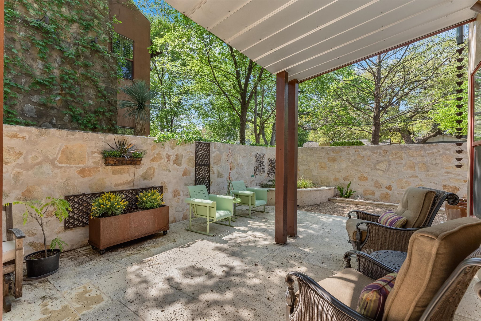 2405 Kinney Road, Unit 2405 Austin, TX 78704 - Photo 15 of 15 Enjoy the outdoors on this 1000 SF limestone Courtyard, partially covered, stone wall