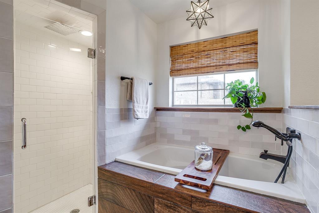 1930 Bethel Road Weatherford, TX 76086 - Photo 20 of 33 a bathroom with a tub shower and sink